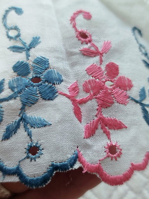 Cotton machine lace with pink and blue flowers