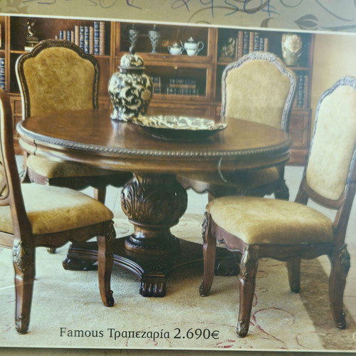 Oval carved dining table made of solid walnut wood like new