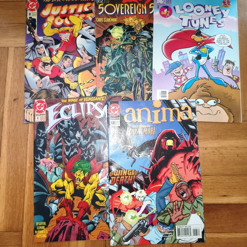 DC Comics bundle with Justice Society 8, Sovereign Seven 1, Looney Tunes 170, Eclipso 4, Anima 13