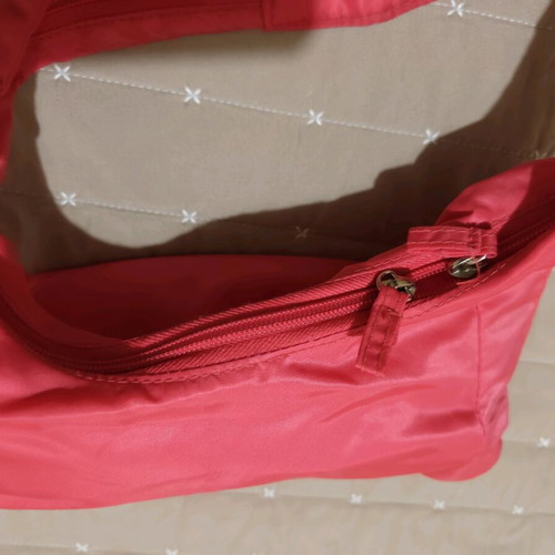 Nylon handbag like new, pink fluo with 3 compartments