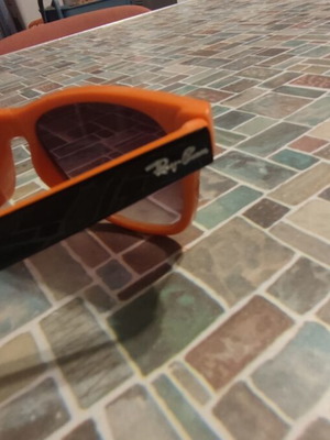 Ray-Ban sunglasses used, orange and black