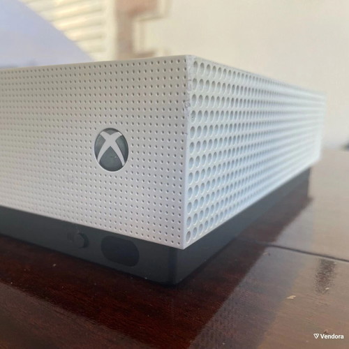 Microsoft Xbox One S 500GB console with two gamepads