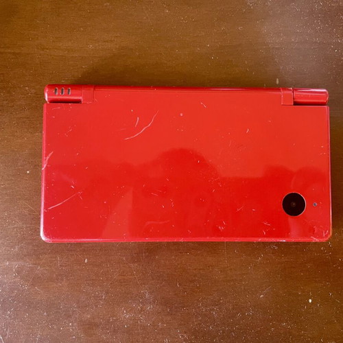 Nintendo DSi console with charger, stylus and memory card