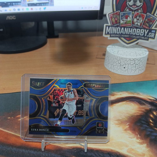 Luka Doncic Snapshots Blue Prizm Card #25 Serial Numbered 41/49 like new