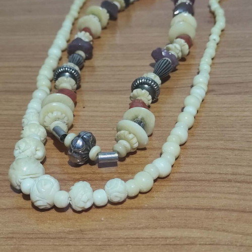 Necklaces from camel bone and semi-precious stones like new