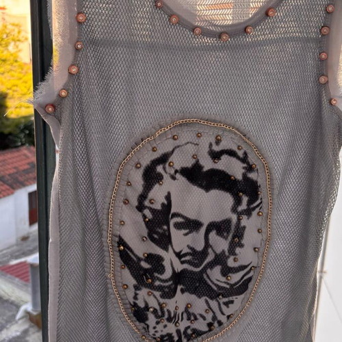 Women's sleeveless blouse gray like new, size small with studs and holes