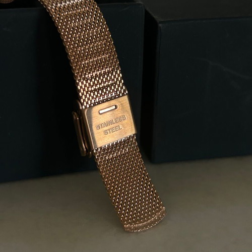 Daniel Wellington Petite Unitone watch with rose gold metal bracelet