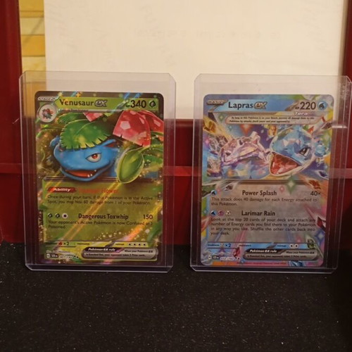 Pokémon cards Venusaur ex and Lapras ex like new