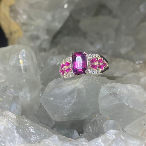 Silver ring with natural rhodolite garnet and moissanite