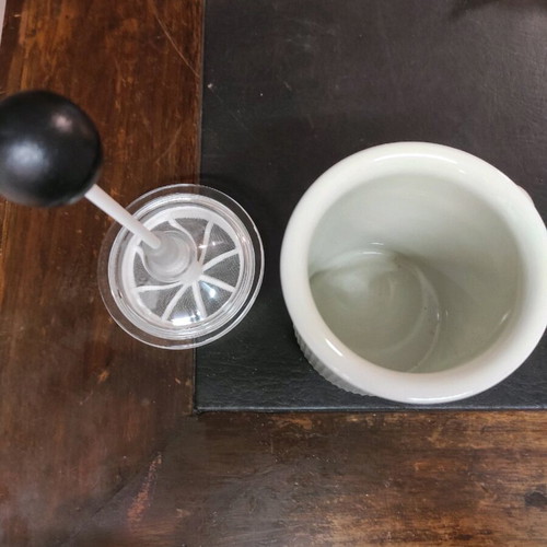 Cappuccino creamer used, porcelain