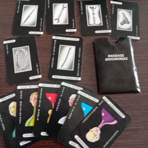 Cluedo 1980s game contents used, includes cards, dice, and murder folder