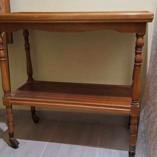 Wooden coffee table used with wheels