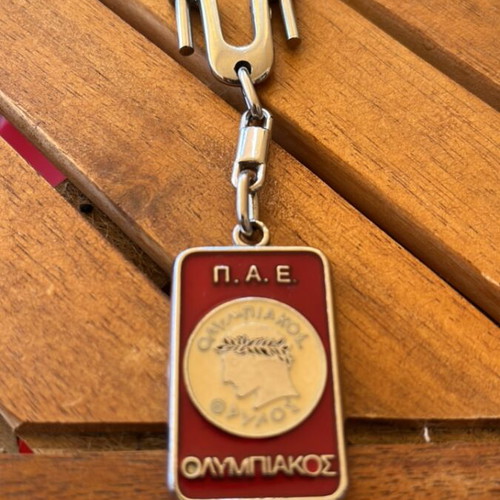 Olympiacos keychain used, missing glass piece