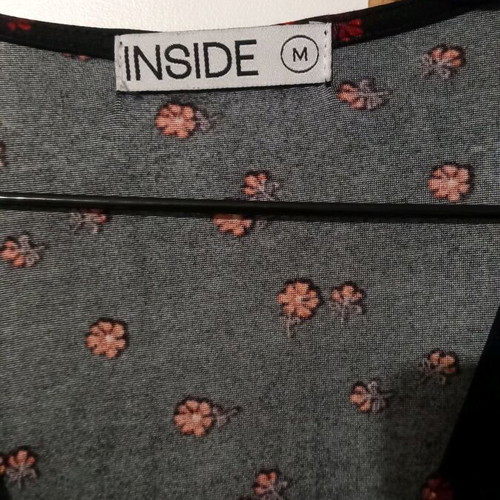 Black short dress with red flowers used