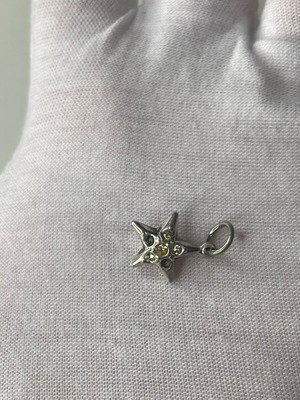 Silver star pendant with stones like new