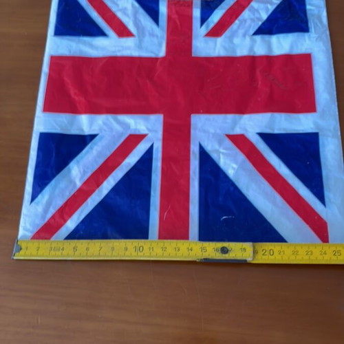 Plastic bag with English flag and small empty London bus box like new