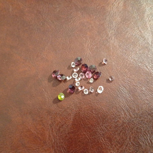 Semi-precious and precious stones like new, set of 23, round cut