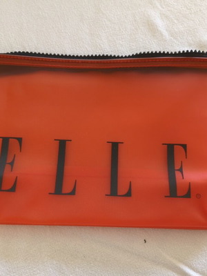 Elle toiletry bag set of 10 like new, translucent orange