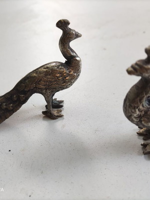 Decorative peacocks like new