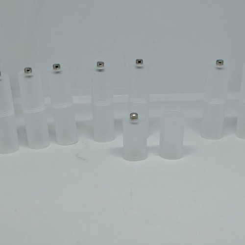 Battery adapters AA to C set of 8, like new, plastic transparent