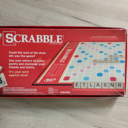 Scrabble board game like new with Latin characters