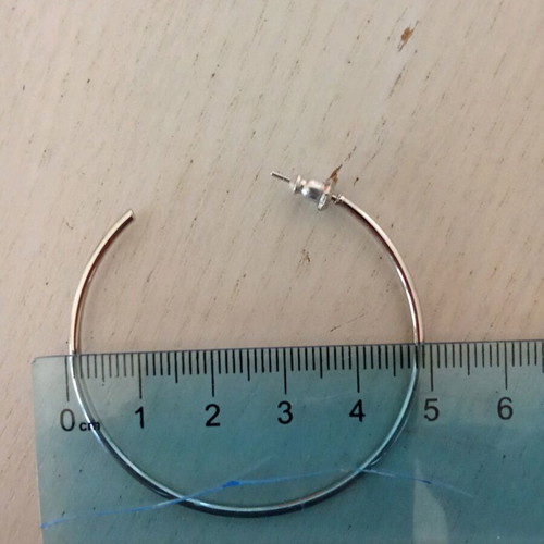Hoop earrings used, silver color, medium size