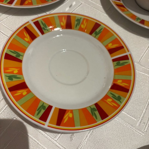 Vintage set of 6 cups and 6 saucers with bright colors, unused
