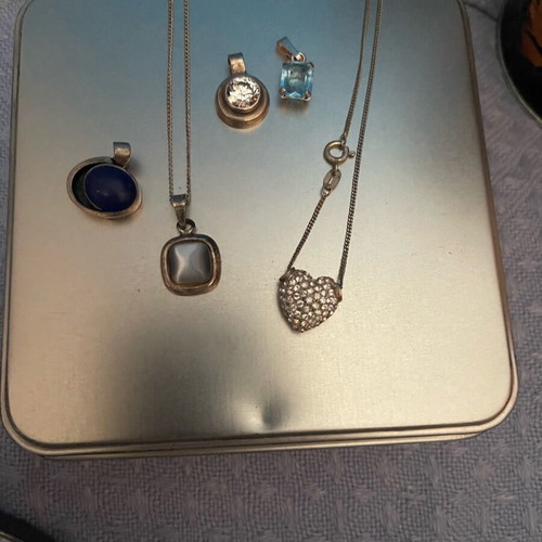Faux Bijoux like new, pack of 10 silver necklace pendants
