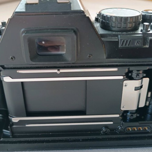 Nikon F301 camera used with 35-135 lens and flash