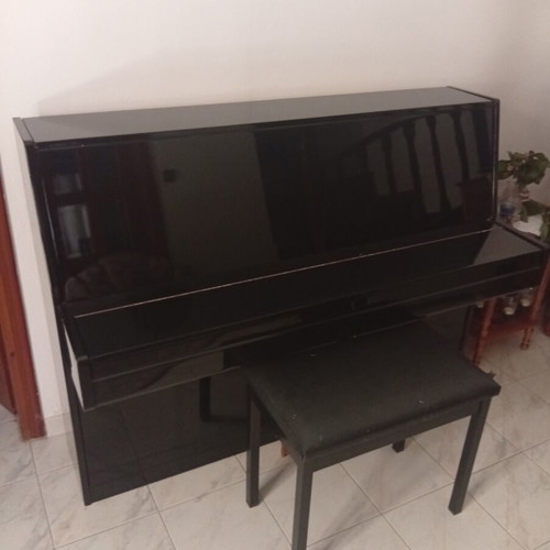 Piano used, black wall Steinbach