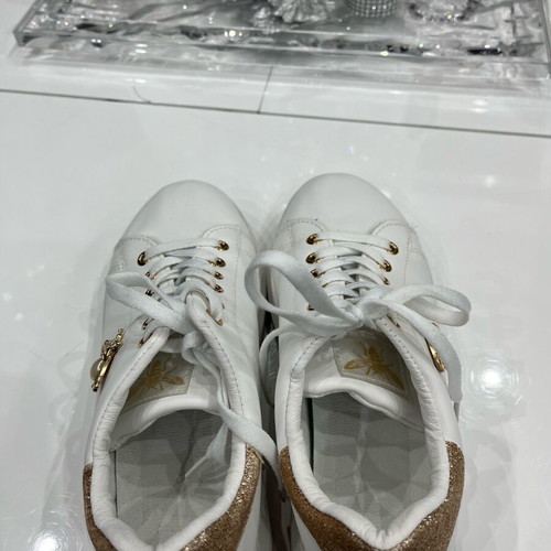 Women's athletic shoes used, white with gold details, size 39