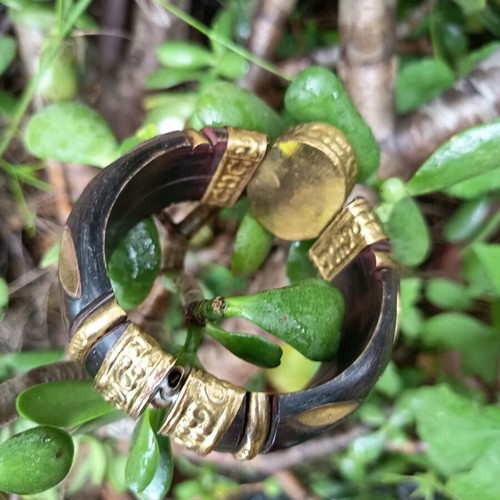 Wooden Boho bracelet used with bronze details and semi-precious stone
