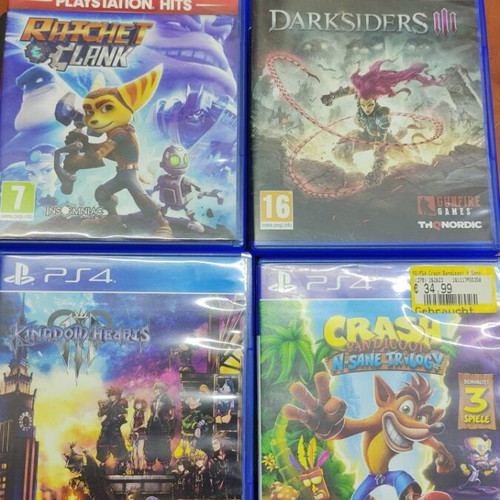 PlayStation 4 Slim 500GB like new with 4 games and 3 controllers