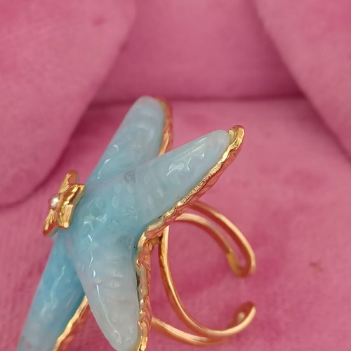 Starfish ring like new with blue marble effect and gold details