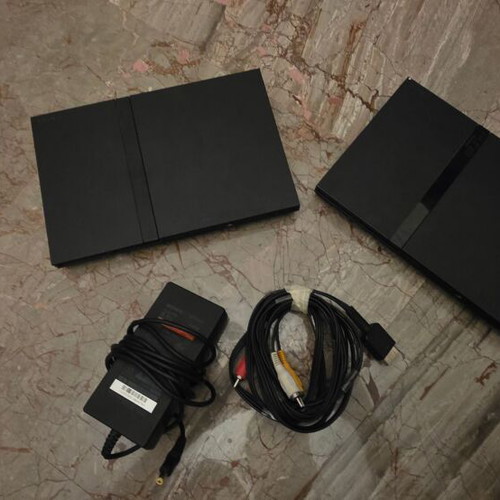 PlayStation 2 (PS2) consoles for parts used, pack of 2