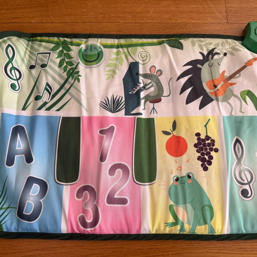 Children's floor piano with animals like new