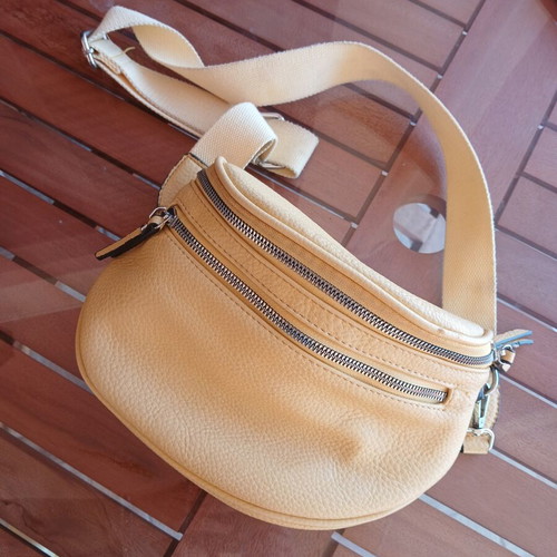 Yellow crossbody belt bag with adjustable strap