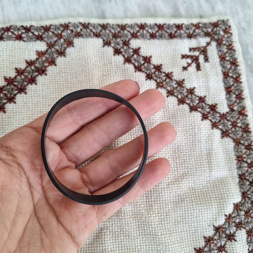 Black elastic rubber bracelet with letters used