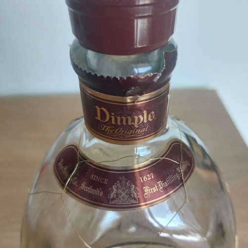 DIMPLE 15 years bottle