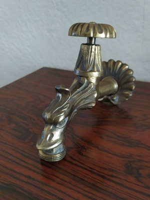 Brass garden faucet like new with decorative design