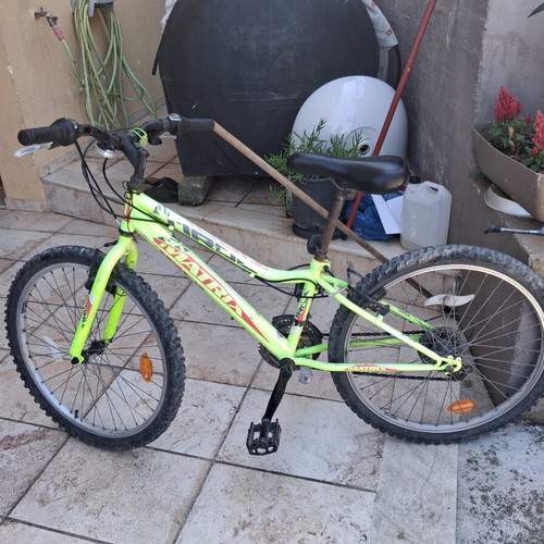Mountain bike used, green, suitable for riders up to 13 years old