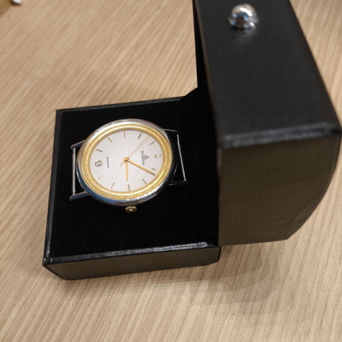 Dugena men's quartz watch like new with gold bezel