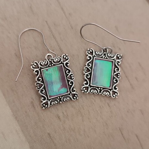Earrings handmade from scratch with iridescent purple-turquoise cadrakia, silver hooks