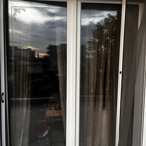 Balcony door 1.80x2.40 with roller shutter and screen, like new