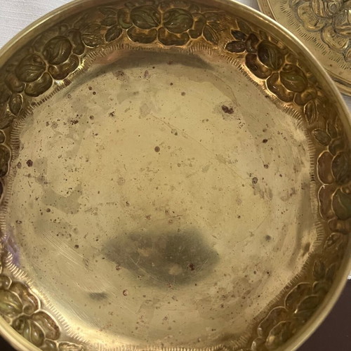 Vintage brass jewelry box used with embossed floral motifs