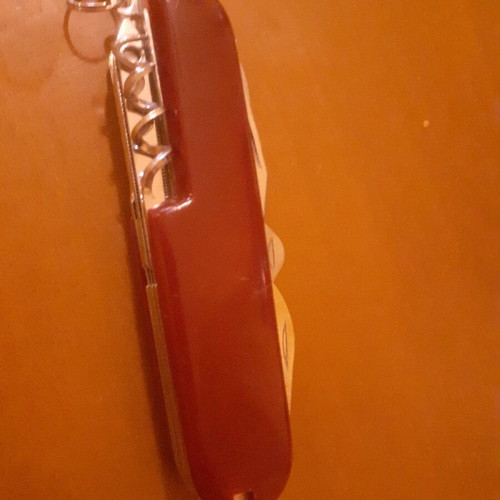 Two multitool pocket knives new with scissors and serrated blade