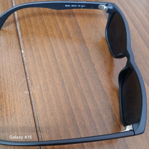 Swing sunglasses new with black plastic frame and men's lenses