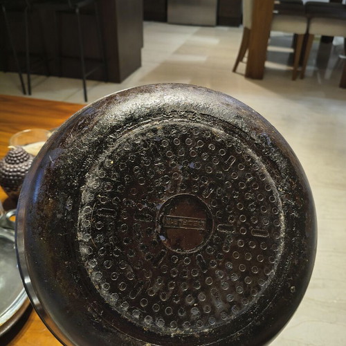 Deep baking pan with lid used, steam vent
