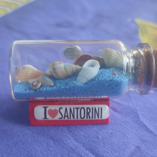 Souvenir from Santorini glass bottle with shells, sand and evil eye magnet like new