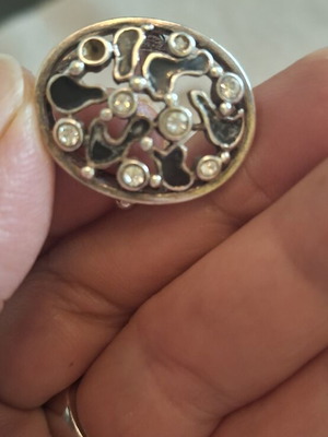 Silver ring used with small stone